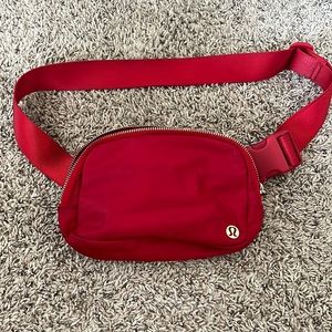 Red Lululemon belt bag